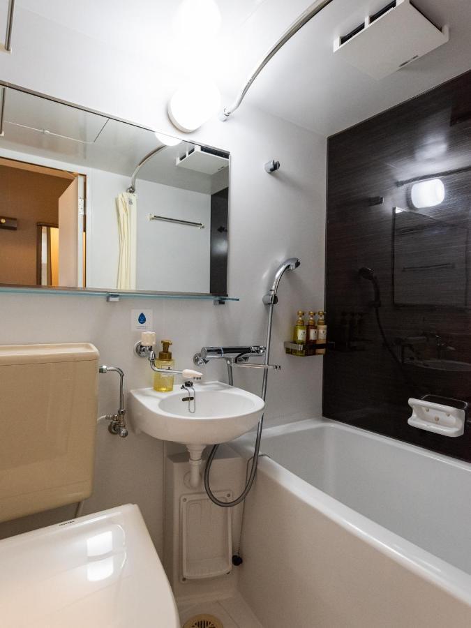 Hotel Etwas Tenjin Fukuoka  Bagian luar foto